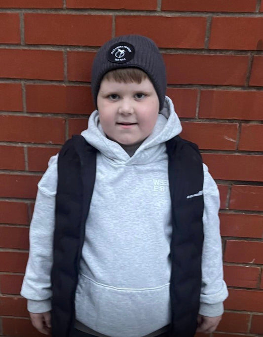 Alexandra George circular fashion beanie