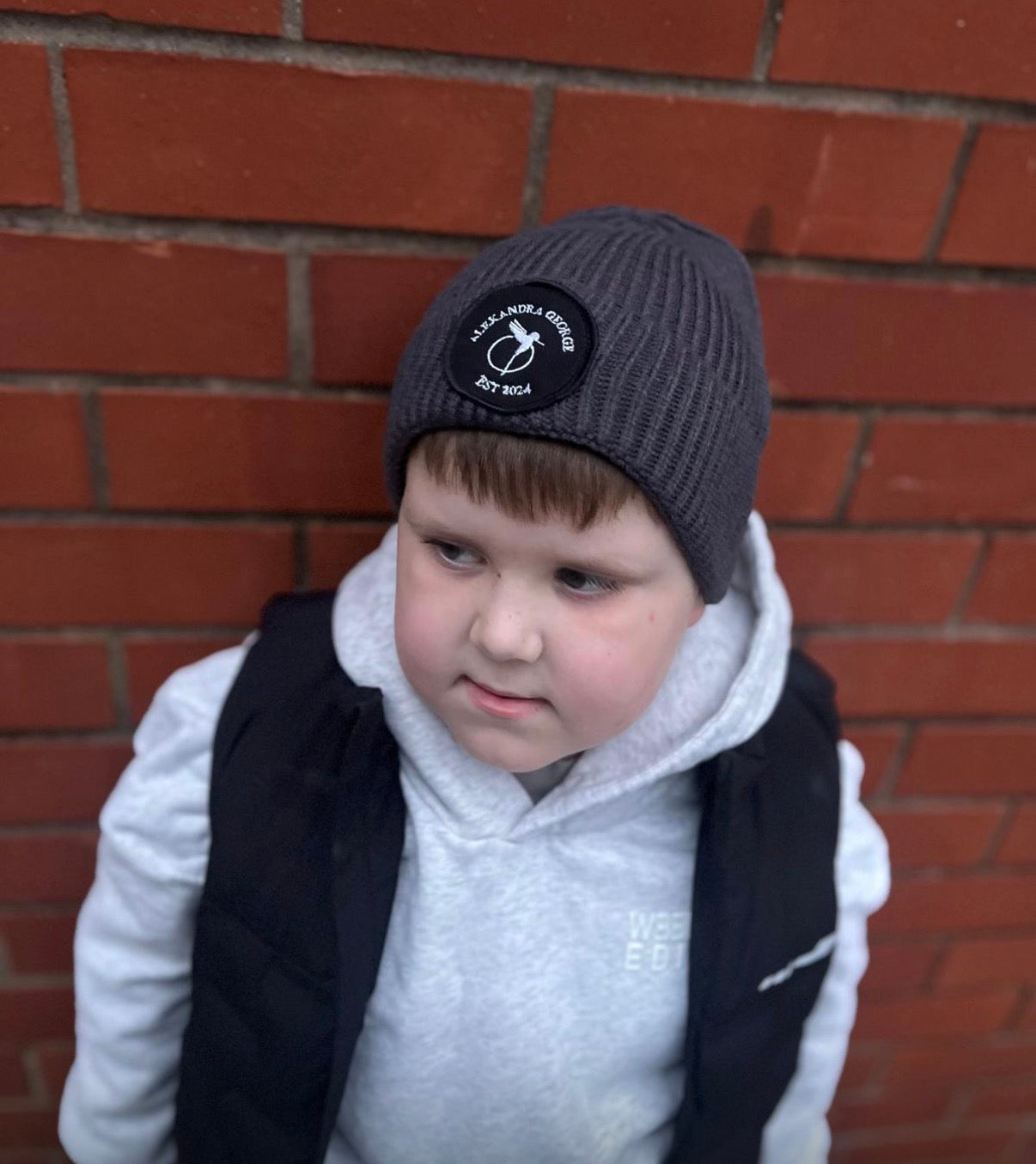 Alexandra George circular fashion beanie